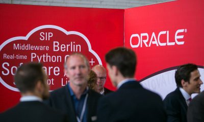 logo of Oracle Corp. sits on the software company's stand at the Connecticum job fair for students, graduates and young professionals at Tempelhof airport in Berlin