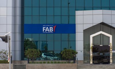 First Abu Dhabi (FAB) Bank blue close up storefront sign and entrance.