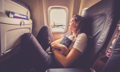 woman sleeping on plane